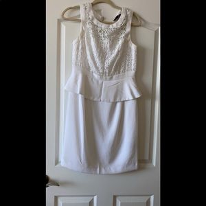 White peplum style dress